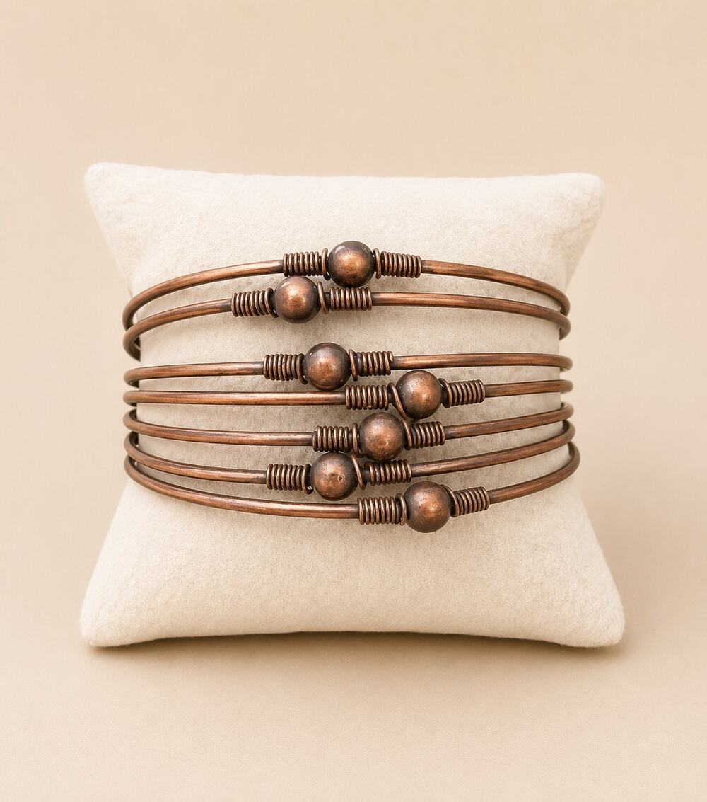 Copper tone multi wire cuff bracelet